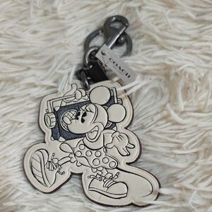 Coach Black and Cream Cartoon Keychain